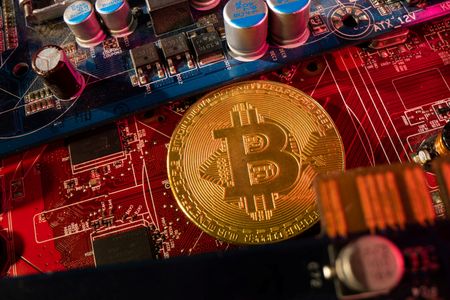 Bitcoin drops to new two-month low as world markets sell off